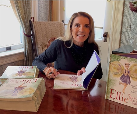 Mardie Caldwell signing Ellie the Brave Bald Fairy book
